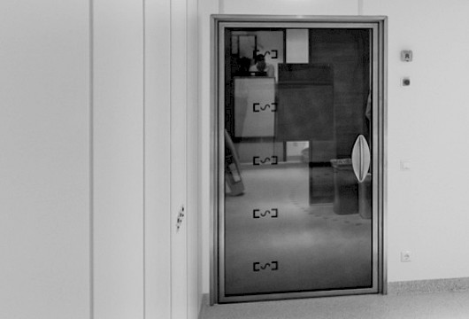 Fully glazed, shielded door